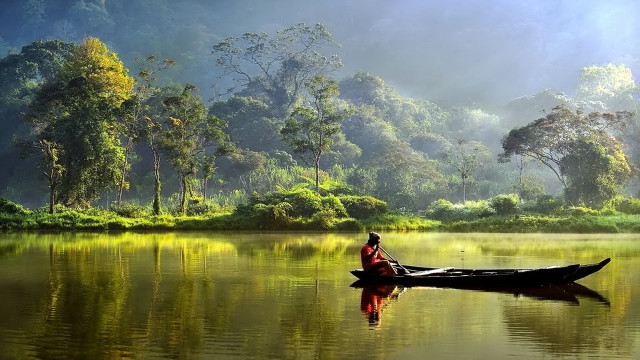 Person boat lake trees mountains free wallpaper - medium preview image