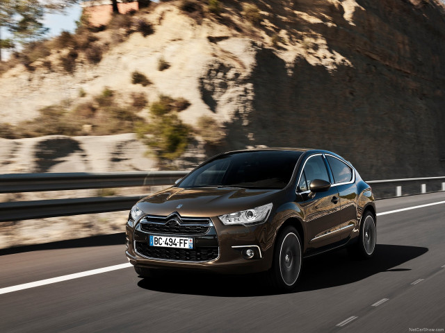 Brown car driving road mountain free wallpaper - medium preview image