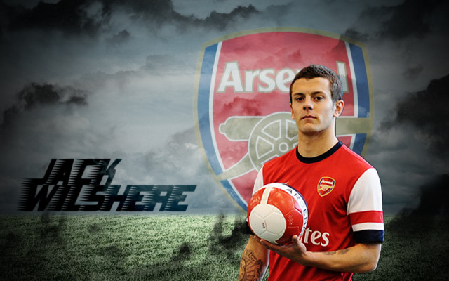 Man holding soccer ball wall free wallpaper - medium preview image