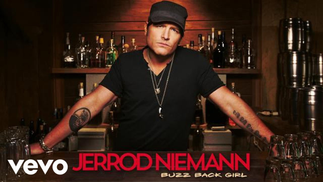 Man behind bar liquor bottles free wallpaper - medium preview image
