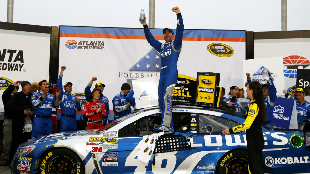 Man standing car trophy hands free wallpaper - medium preview image