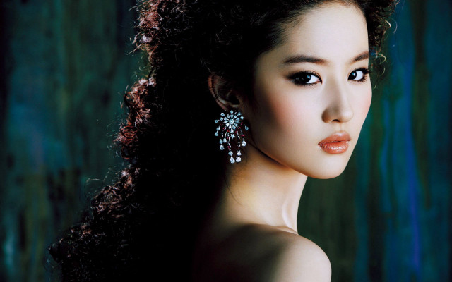 Woman long hair earrings green free wallpaper - medium preview image