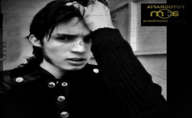 Man black shirt black sweater free wallpaper - medium preview image