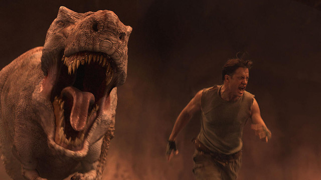 Man running dinosaur cave huge free wallpaper - medium preview image