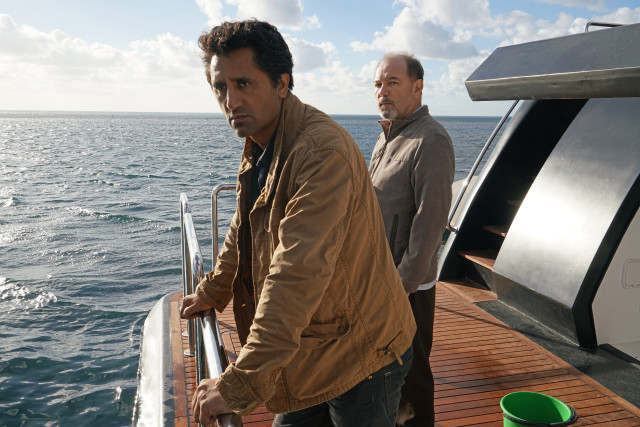 Two men boat looking camera free wallpaper - medium preview image