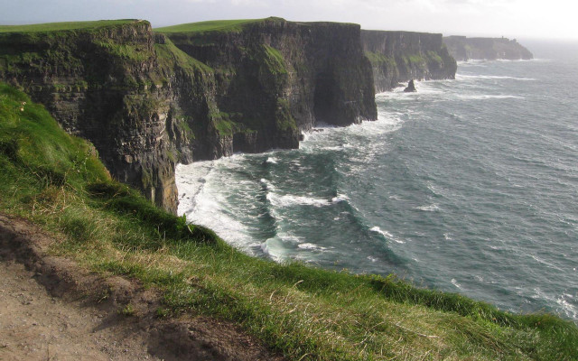 Cliff grassy area water edge free wallpaper - medium preview image