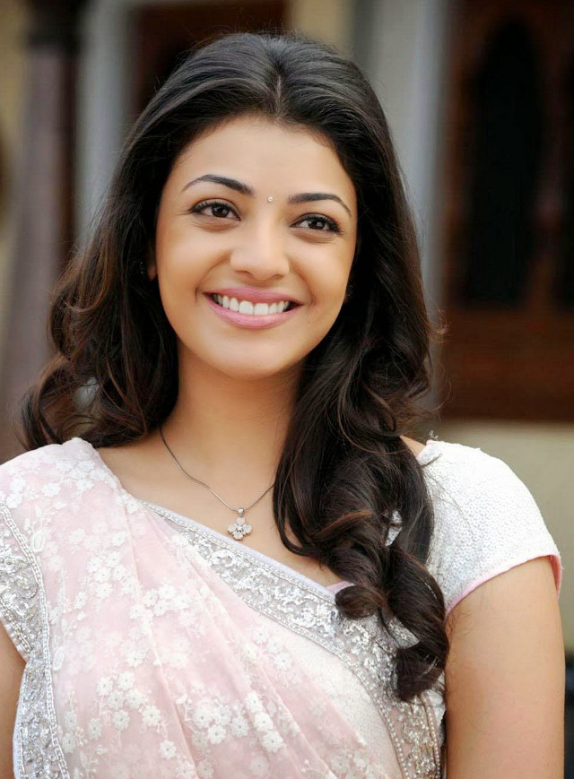Woman white sari smiling camera free wallpaper - medium preview image