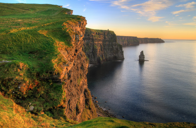Cliff boat lighthouse sunset water free wallpaper - medium preview image