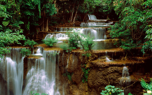 Waterfall flowing trees people edge free wallpaper - medium preview image