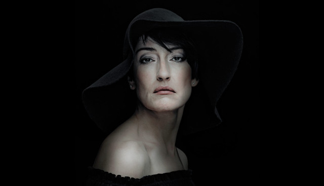 Woman black hat black background free wallpaper - medium preview image