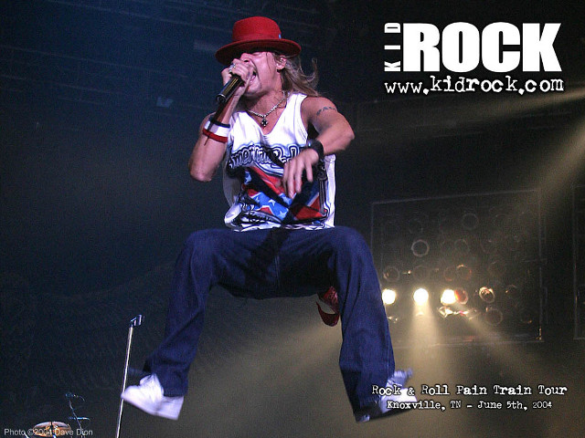 Man red hat stage microphone free wallpaper - medium preview image