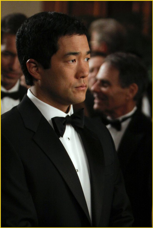 Man tuxedo looking side suits free wallpaper - medium preview image