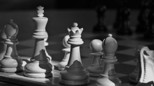 Chess board pieces person standing free wallpaper - medium preview image