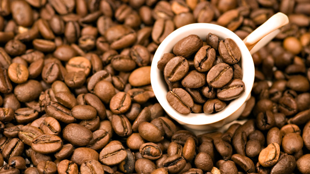 White cup coffee beans table free wallpaper - medium preview image