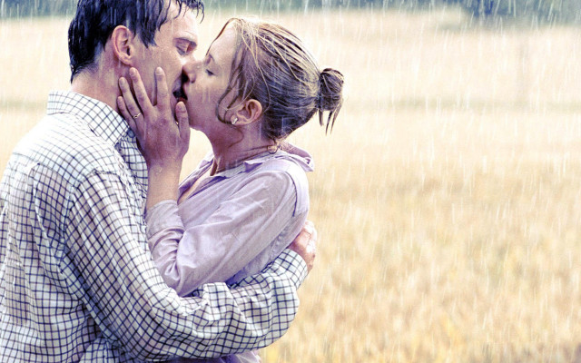 Man woman kissing rain field free wallpaper - medium preview image
