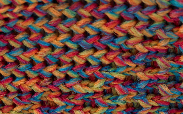 Multicolored knitted blanket black background free wallpaper - medium preview image