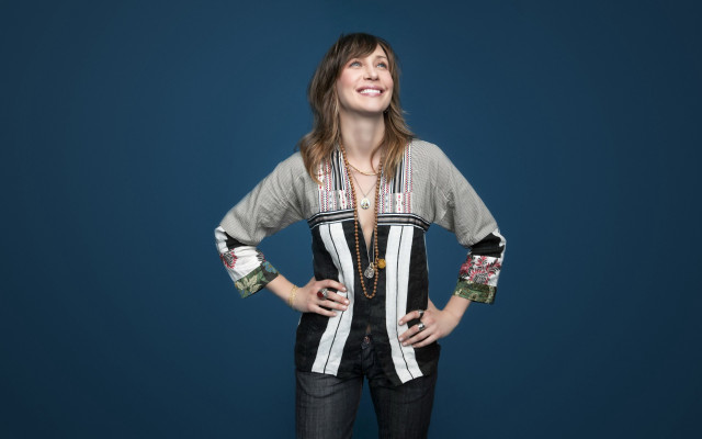 Woman hands hips smile cardigan free wallpaper - medium preview image