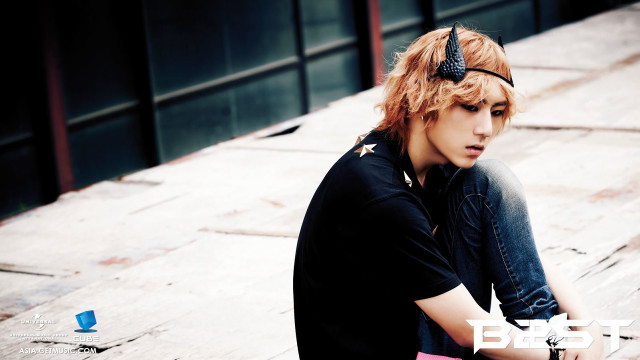 Young man skateboard wooden floor free wallpaper - medium preview image