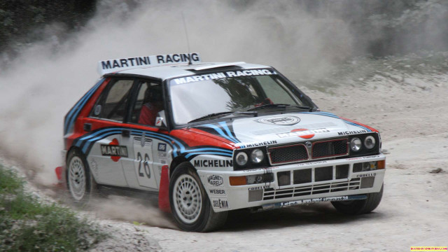 Car driving dirt road dust free wallpaper - medium preview image