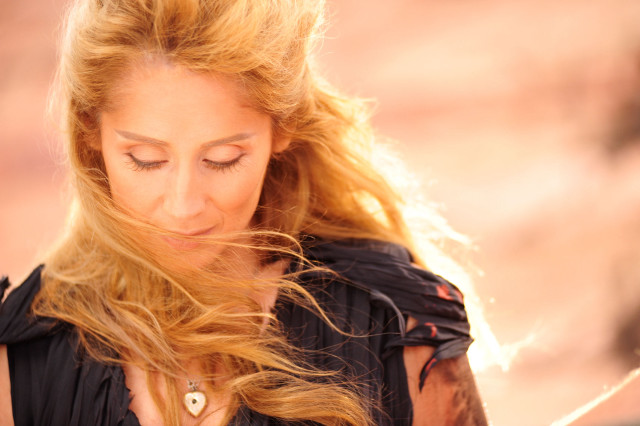 Woman blonde hair looking down free wallpaper - medium preview image