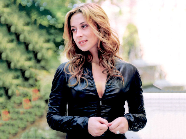 Woman black leather jacket tree free wallpaper - medium preview image