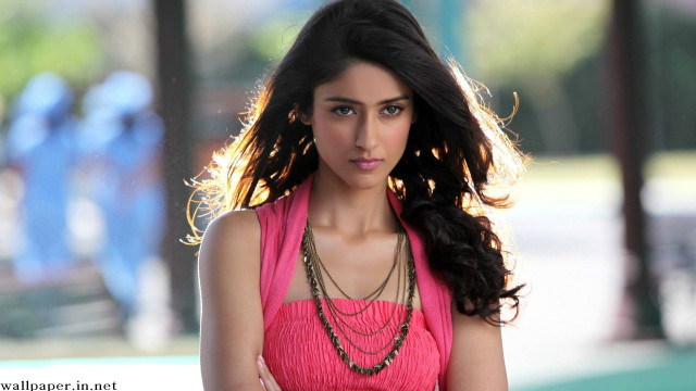 Woman pink top serious portrait free wallpaper - medium preview image
