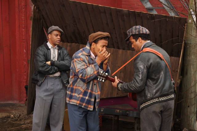 Three men red building talking free wallpaper - medium preview image