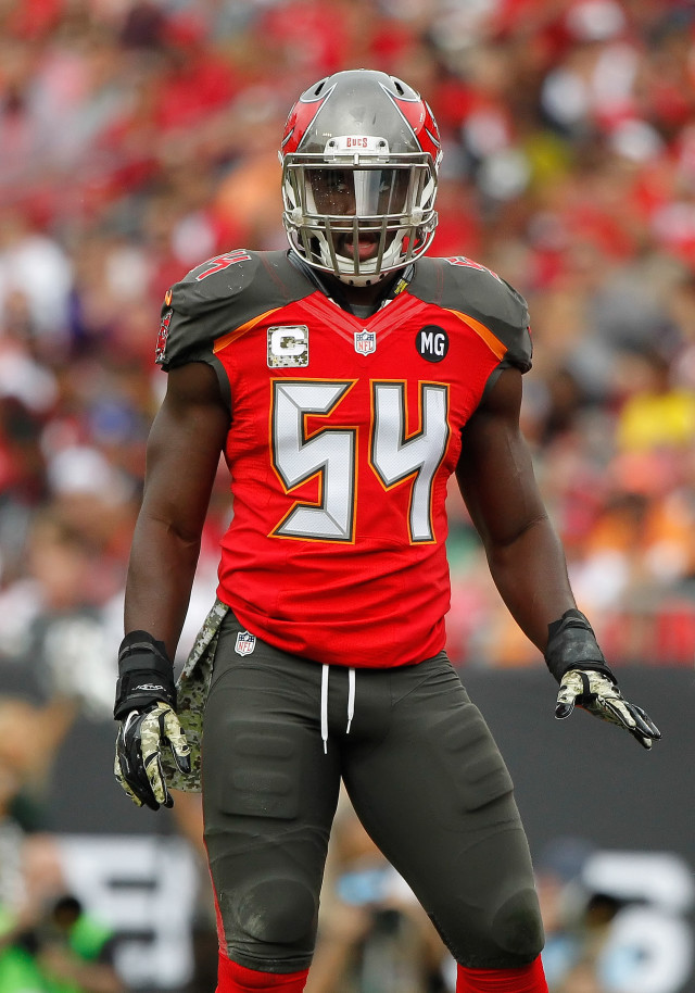 Football player red uniform field free wallpaper - medium preview image