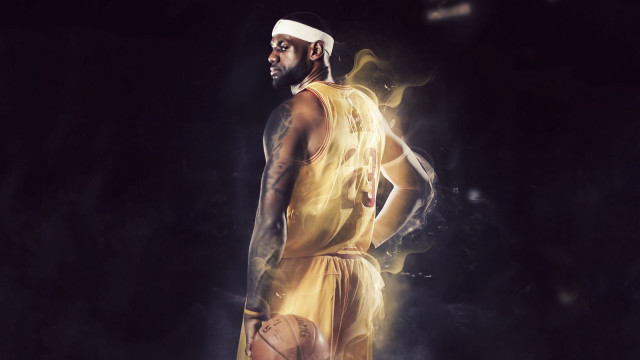 Man yellow uniform holding basketball free wallpaper - medium preview image