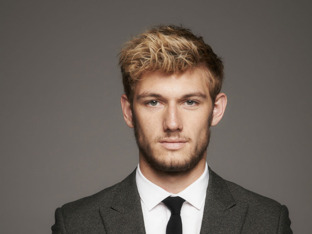 Man in suit serious portrait free wallpaper - medium preview image