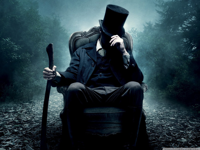 Man top hat coat sitting #3 free wallpaper - medium preview image