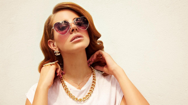 Woman sunglasses necklace pose marble free wallpaper - medium preview image