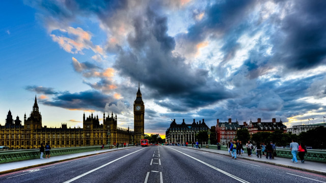 Cloudy sky clock tower cityscape free wallpaper - medium preview image