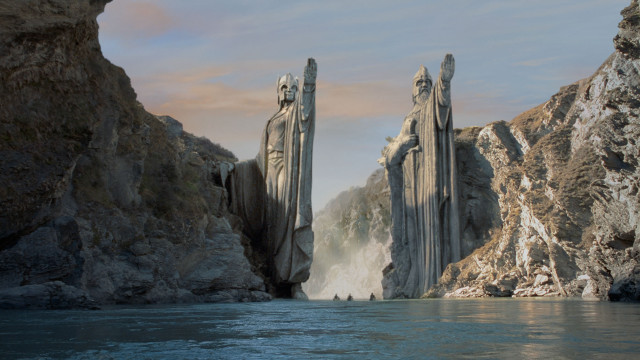Lake mountains rocks statue person free wallpaper - medium preview image