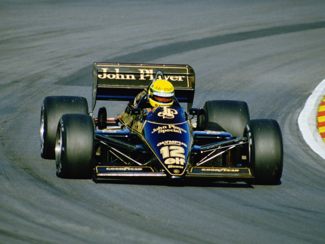 Man driving racing car yellow free wallpaper - medium preview image
