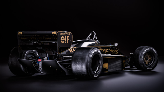 Black yellow racecar frontwheel detailed free wallpaper - medium preview image
