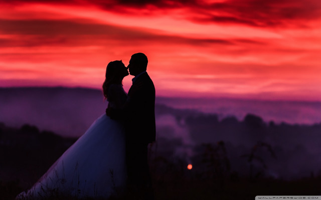 Bride groom kissing sunset sky free wallpaper - medium preview image