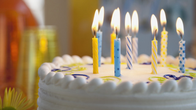 White cake lit candles yellow free wallpaper - medium preview image