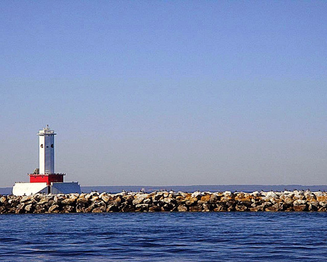 Lighthouse rock wall ocean boat free wallpaper - medium preview image