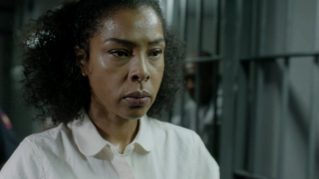 Concerned woman prison cell man free wallpaper - medium preview image