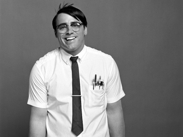Man smiling glasses gray background free wallpaper - medium preview image