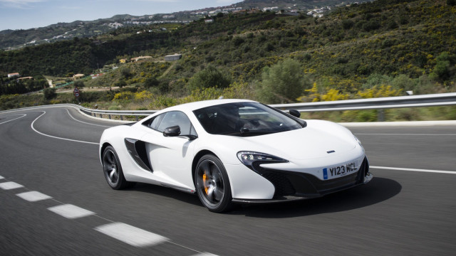 White sports car hillside trees free wallpaper - medium preview image