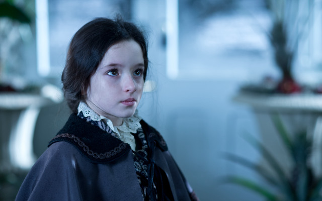 Woman blackjacket whitecollar pottedplant portrait free wallpaper - medium preview image
