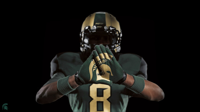 Football player green gold uniform free wallpaper - medium preview image