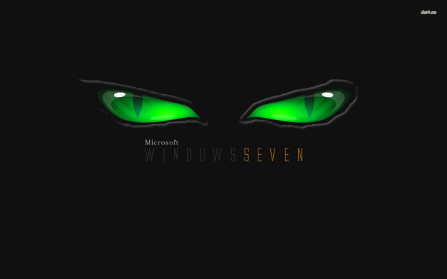 Green eyes glowing black background free wallpaper - medium preview image