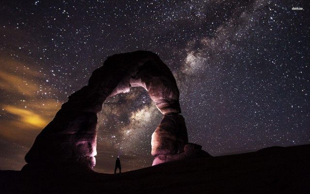 Person standing arch night sky #2 free wallpaper - medium preview image