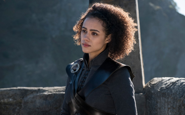 Woman black jacket rock wall free wallpaper - medium preview image