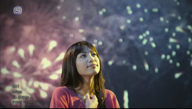 Woman fireworks hand chin looking free wallpaper - medium preview image