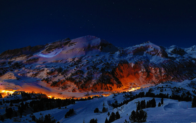 Snowy mountain lit area night free wallpaper - medium preview image