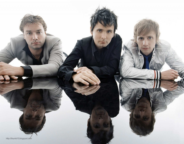 Three men sitting reflective surface free wallpaper - medium preview image